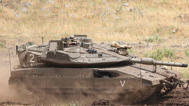 May 10, 2018: An Israeli Tank drives in the Israeli-controlled Golan Heights,