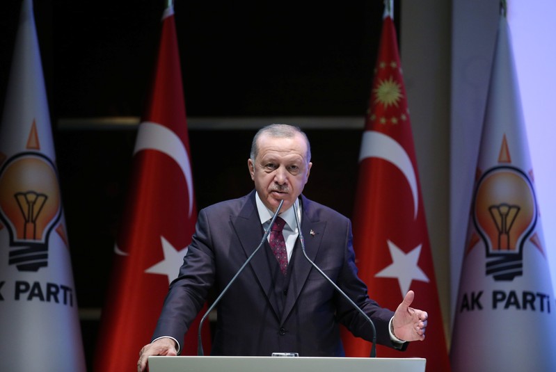 Turkish President Tayyip Erdogan addresses members of his ruling AK Party during a meeting in Ankara, Turkey, October 30, 2019. 