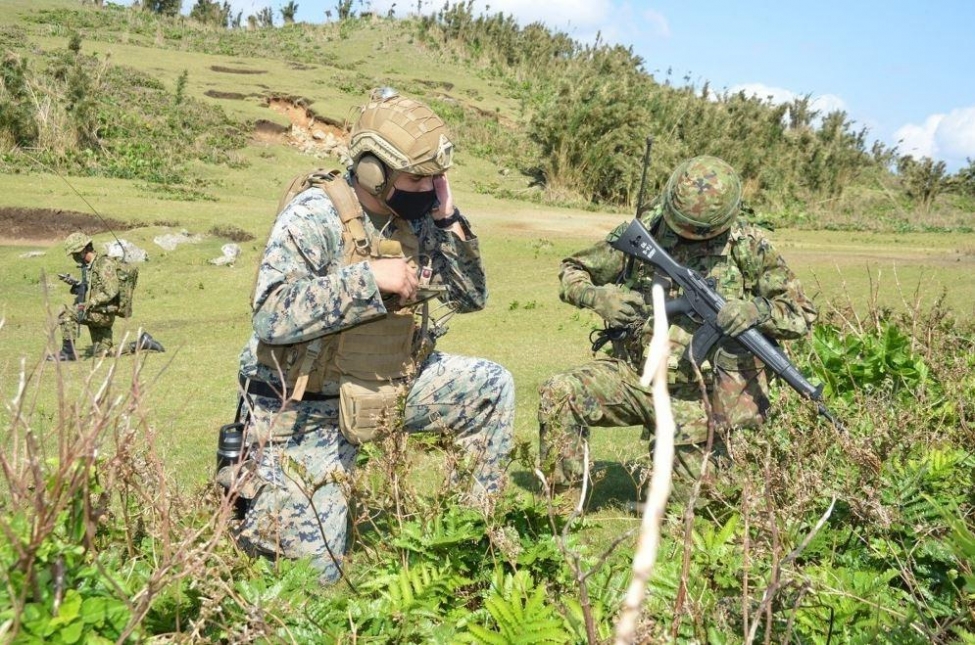 U.S. Marines conduct field maneuvers in Japan during "Keen Sword 21," and 11-day exercise involving 9,000 U.S. troops and 37,00 members of the Japan Self-Defense Force.