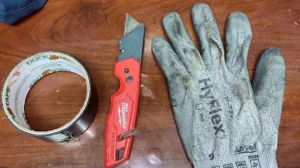 Benicia Police Department posted a folding knife, a roll of duct tape and a glove recovered from the crime scene. (Benicia Police Department)