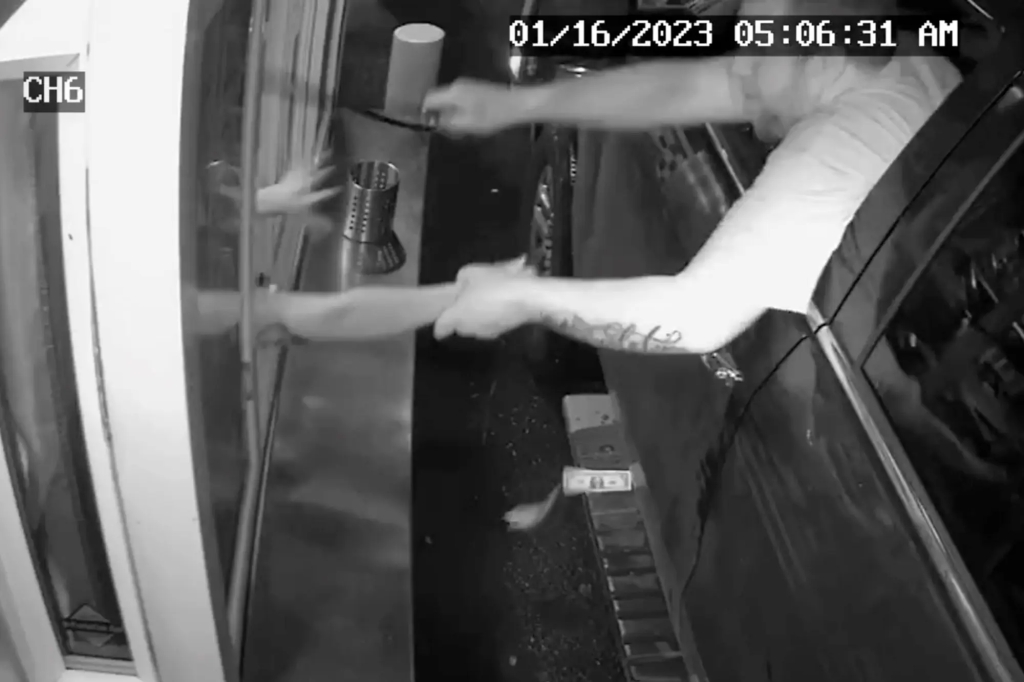 In the footage taken Monday, the man is seen grabbing the barista by the hand and attempting to place a ziptie loop on it to drag her out of the hut.Auburn WA Police Dept